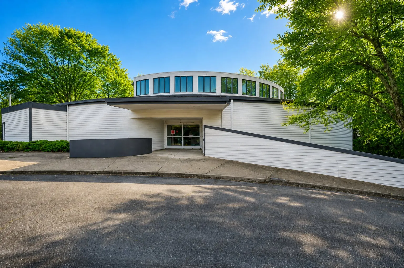 Exterior entrance of 125 Dillon Drive with covered entry and ramp